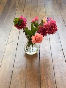 flowers on floor of meetinghouse